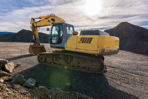 istock Excavator building a road in a site construction 1400210013