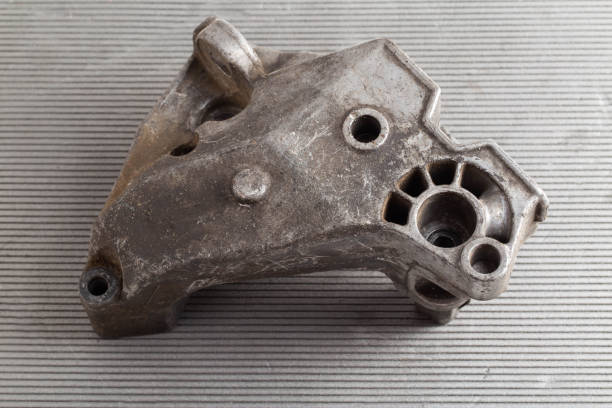 istock Aluminum pad and car engine mount, close-up 1400211870