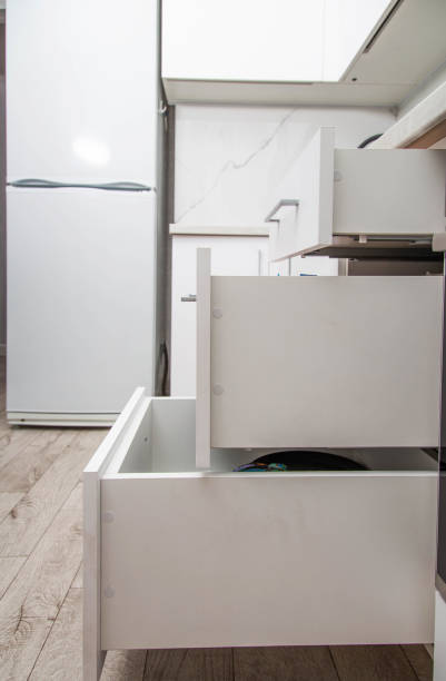 istock Modern sliding drawer system in the kitchen. Production of kitchen furniture. Ergonomics and design, close-up 1400211971