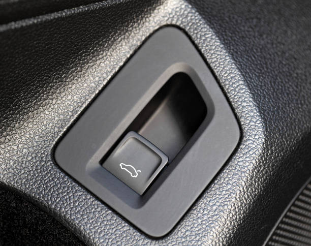 istock Black modern button to open the trunk in the car, macro 1400212017