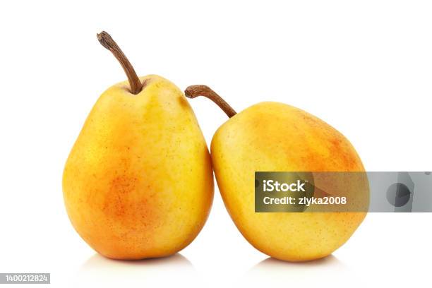 Two Yellow Fresh Ripe Pears Isolated On White Background Stock Photo - Download Image Now