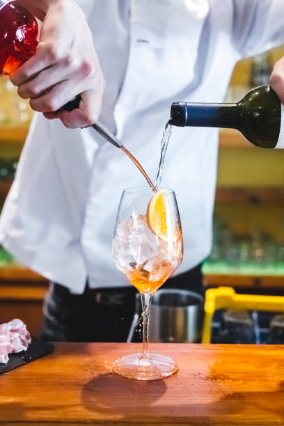 istock Spritz drink preparation at the bar counter 1400212862