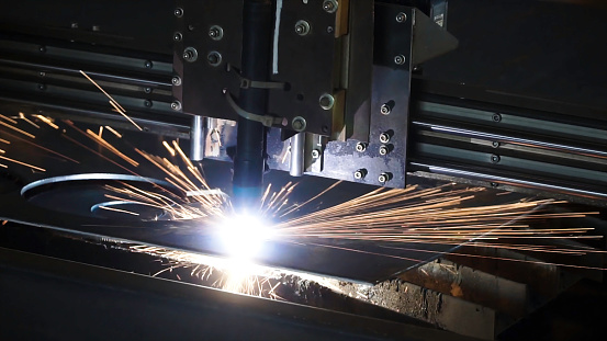 Industrial plasma machine cutting of metal plate. Clip. Cutting metal plates gas cutting. Steel plate cutting by gas machine.