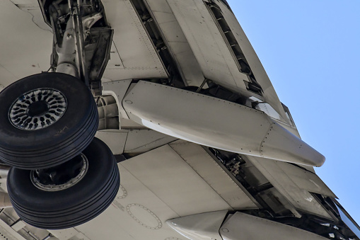 Detail of 737 wing and main gear prepared for landing