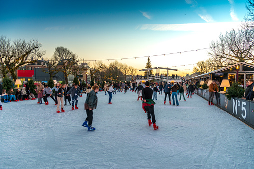 Montreal, Canada - 5th March 2016: People skating at Old Port Ice Skating Rink