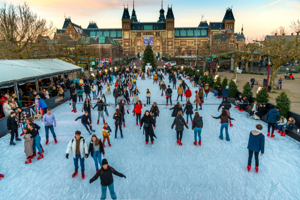 Ice rink Rijksmuseum on a bright day during winter in Amsterdam. the netherlands stock photo