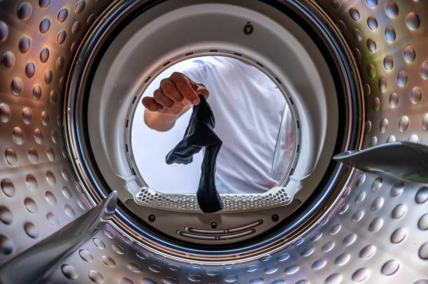 istock A single sock in the washing machine with view from the washing machine 1400217583