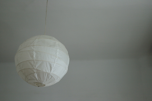 round paper ceiling lamp with writing space