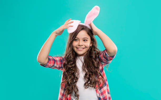 istock Springtime. time for fun. adorable kid wearing funny hare ears. easter spring holiday. 1400219856