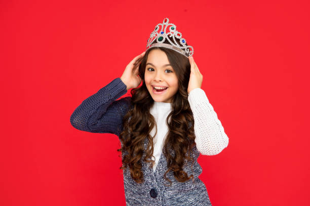 happy amazed child in queen crown. princess in tiara. proud kid. teen girl wear diadem - beauty queen imagens e fotografias de stock