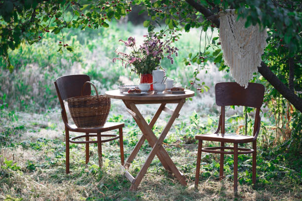 tea party in the garden - flower cherry cup tea imagens e fotografias de stock