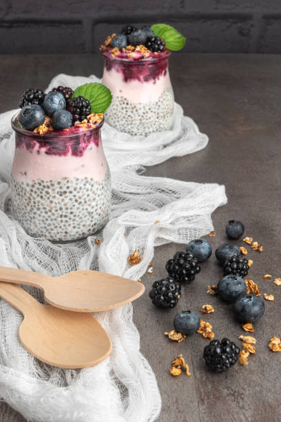 istock Chia pudding parfait with blackberries and blueberry smoothie and granola. 1400221973