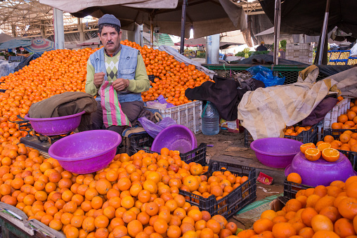 Agadir, Morocco - March 01, 2016: Orange stall in the popular Souk El Had in the city center