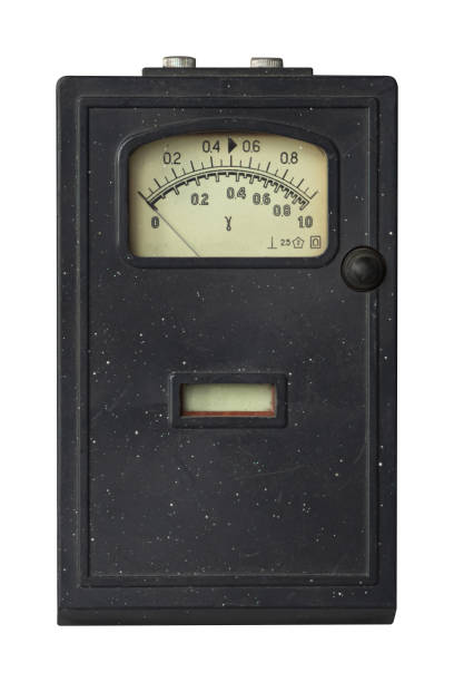 Old analog vintage dosimeter for measuring gamma radiation isolated on white background. Old analog vintage dosimeter for measuring gamma radiation isolated on white background. radiation dosimeter stock pictures, royalty-free photos & images