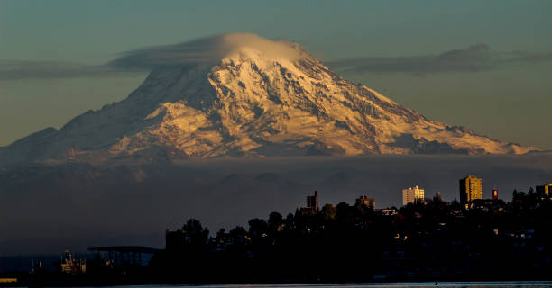 istock Mt. Ranier roaring over Tacoma, WA at sunset 1400230013