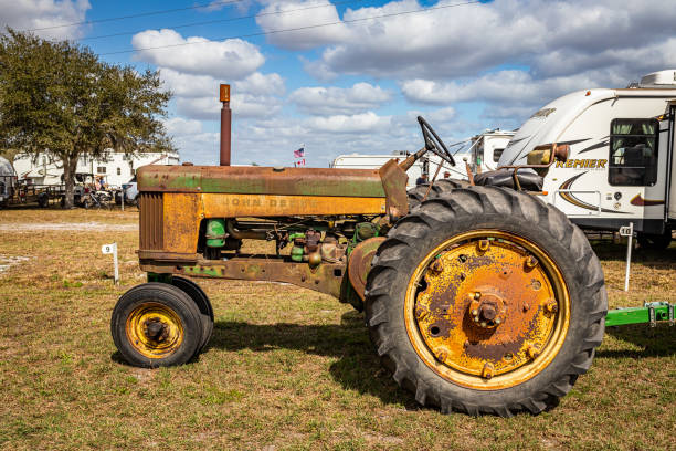 Elmira, Ontario, Canada - July 20, 2016: Farm equipment in a recently harvested field of wheat in rural Southwesten Ontario.