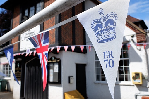 Chorleywood, Hertfordshire, England, Uk - May 31st 2022: Queen Elizabeth II Platinum Jubilee flags outside village hall