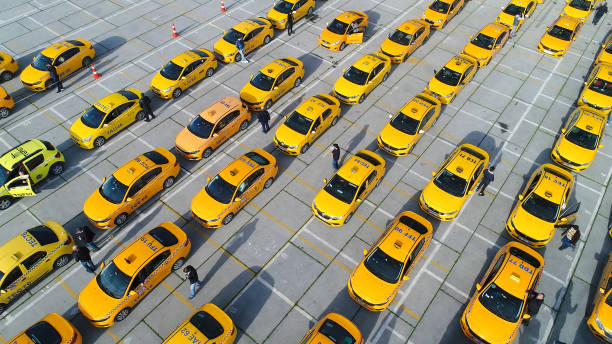 Aerial View of Taxi Cabs istanbul, Turkey – December 5, 2021: Aerial View of Taxi Cabs yellow taxi cab stock pictures, royalty-free photos & images
