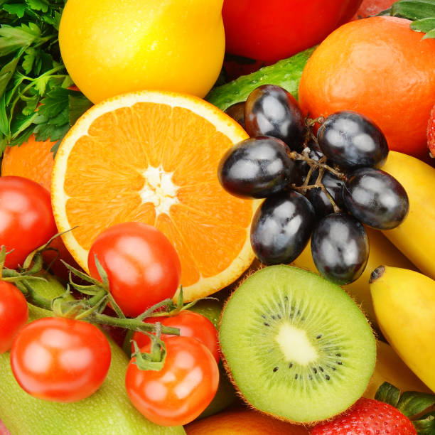 istock Background of fresh fruits and vegetables . 1400238193