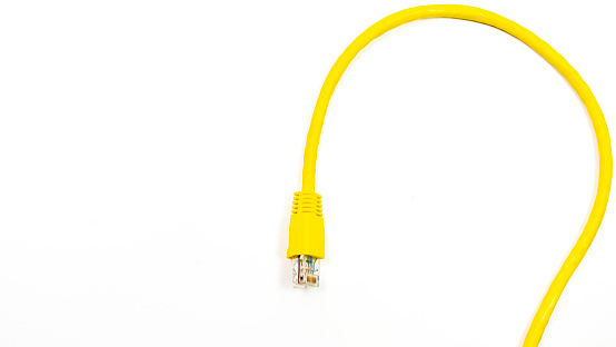 Network ethernet cable with RJ45 connectors on white background