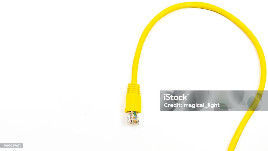 Network ethernet cable with RJ45 connectors Network ethernet cable with RJ45 connectors on white background Network Connection Plug Stock Photo