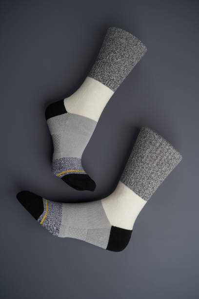 istock Colorful socks on gray background, close-up 1400248282