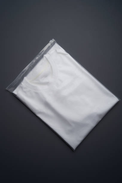 istock Folded t-shirt on a gray background, top view 1400248291