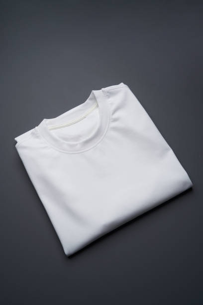 istock Folded t-shirt on a gray background, top view 1400248293