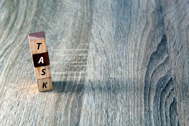 istock Wooden block cube with text 