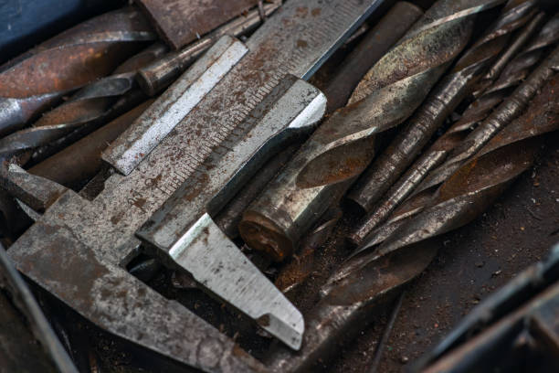istock old vintage hand tools - set of drills and old caliper on a iron background 1400252635