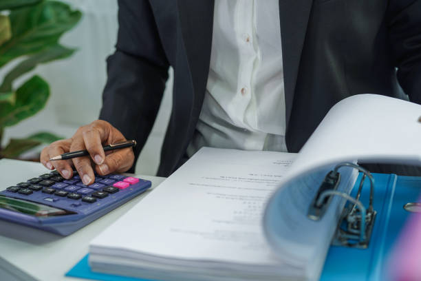 istock Stack of binder file folder on table in business modern office.