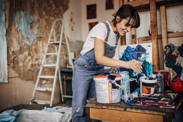 istock Female artist in her studio 1400255333