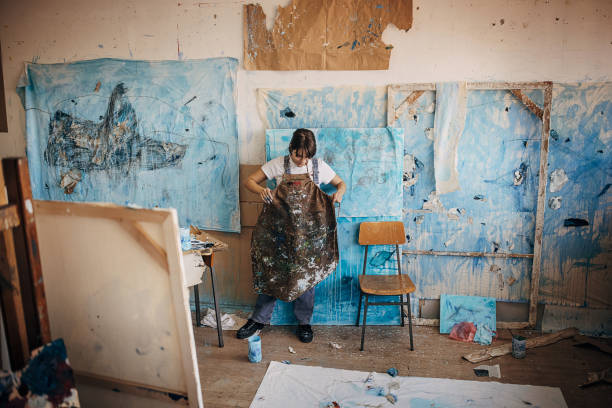 istock Female artist in her studio 1400255619