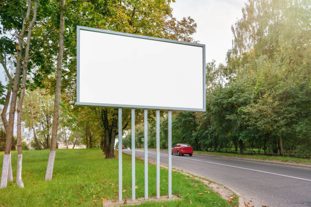 istock Advertising billboard with copy space for mockup stands on roadside 1400255680