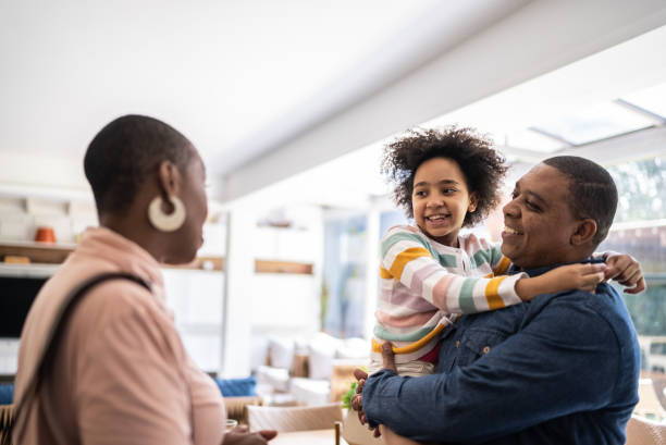 istock Real estate agent talking to father and daughter 1400256648