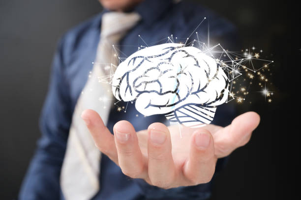 istock Hands holding a brain with network connections, concept of innovative science and communication technology 1400258342