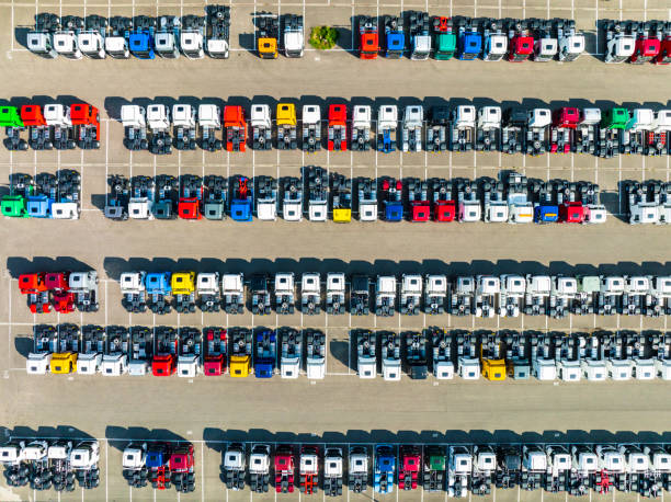 istock Trucks in a row at a parking lot seen from above 1400258661
