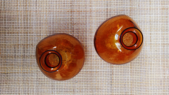two amber glass essential design bottle view from the top