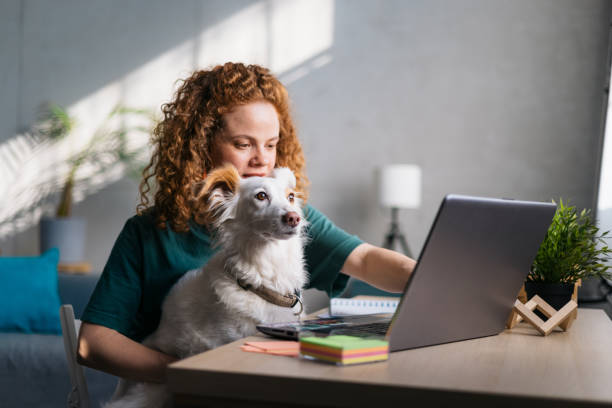 istock Young female freelancer working from home 1400259824