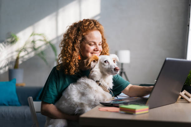 istock Happy young female freelancer working from home 1400259825