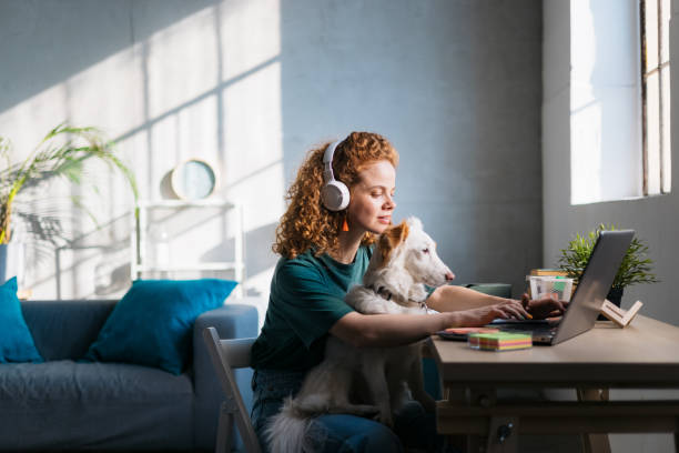 istock Young female freelancer working from home 1400259854