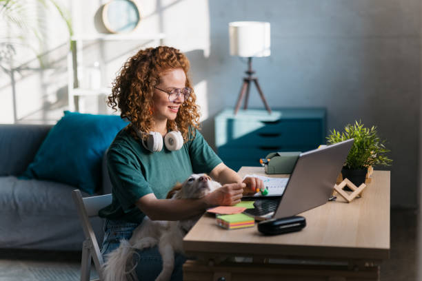 istock Adult female student studying online using a laptop 1400259871