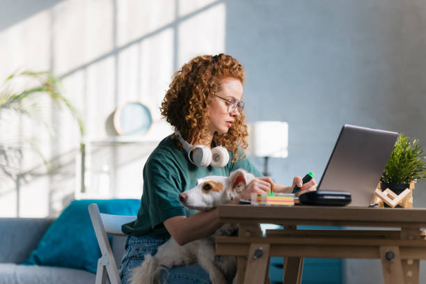 istock Adult female student studying online using a laptop 1400259928