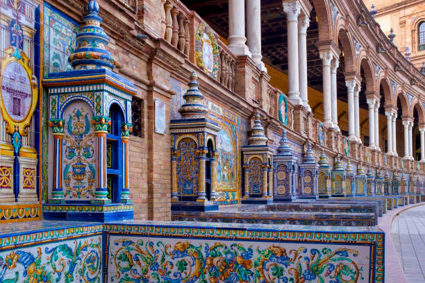 Provincial Alcoves The tiled Provincial Alcoves along the walls of the Plaza de España. sevilla province stock pictures, royalty-free photos & images