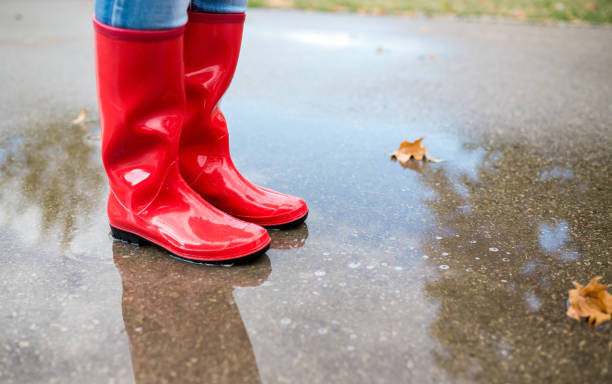 istock Woman in rain boots 1400262840