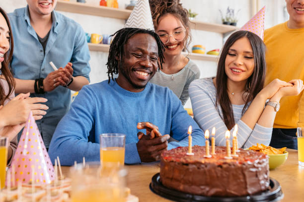 istock Group Of Friends Celebrating Birthday 1400265918