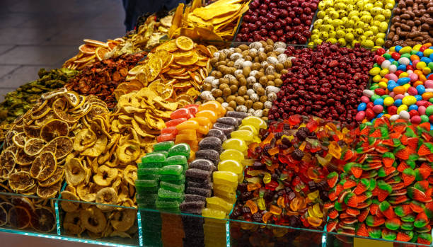 istock Different types of sweets on market counter. 1400266777