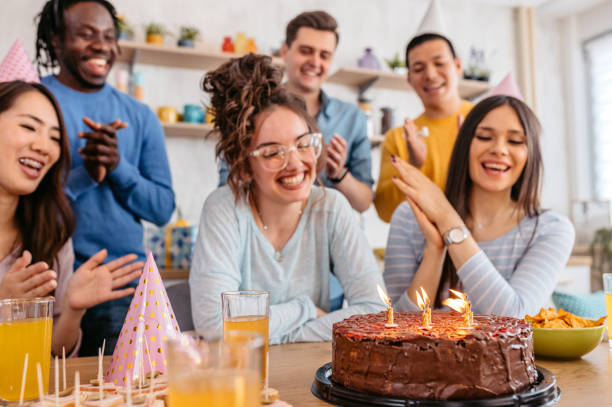 istock Group Of Friends Celebrating Birthday 1400266835