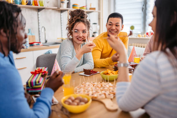 istock Group Of Friends Celebrating Birthday 1400266904