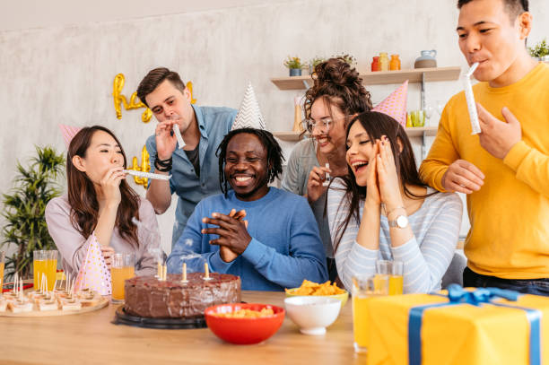istock Group Of Friends Celebrating Birthday 1400267242
